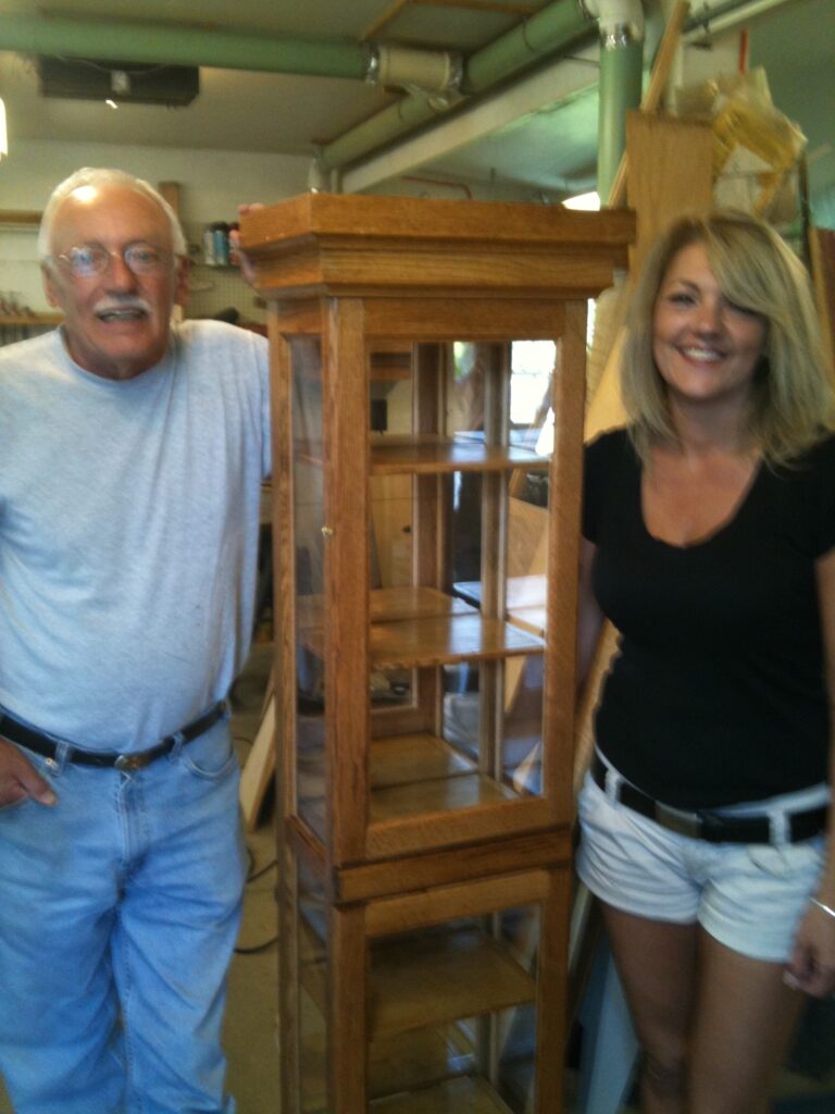 Remembering Dad β€οΈβπ©Ή Shelia with her dad, Rick Hinkle, standing beside the wooden cabinet he handmade for her.